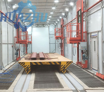 Spray booth trolley conveying system