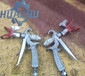 Two spray guns in the paint booth